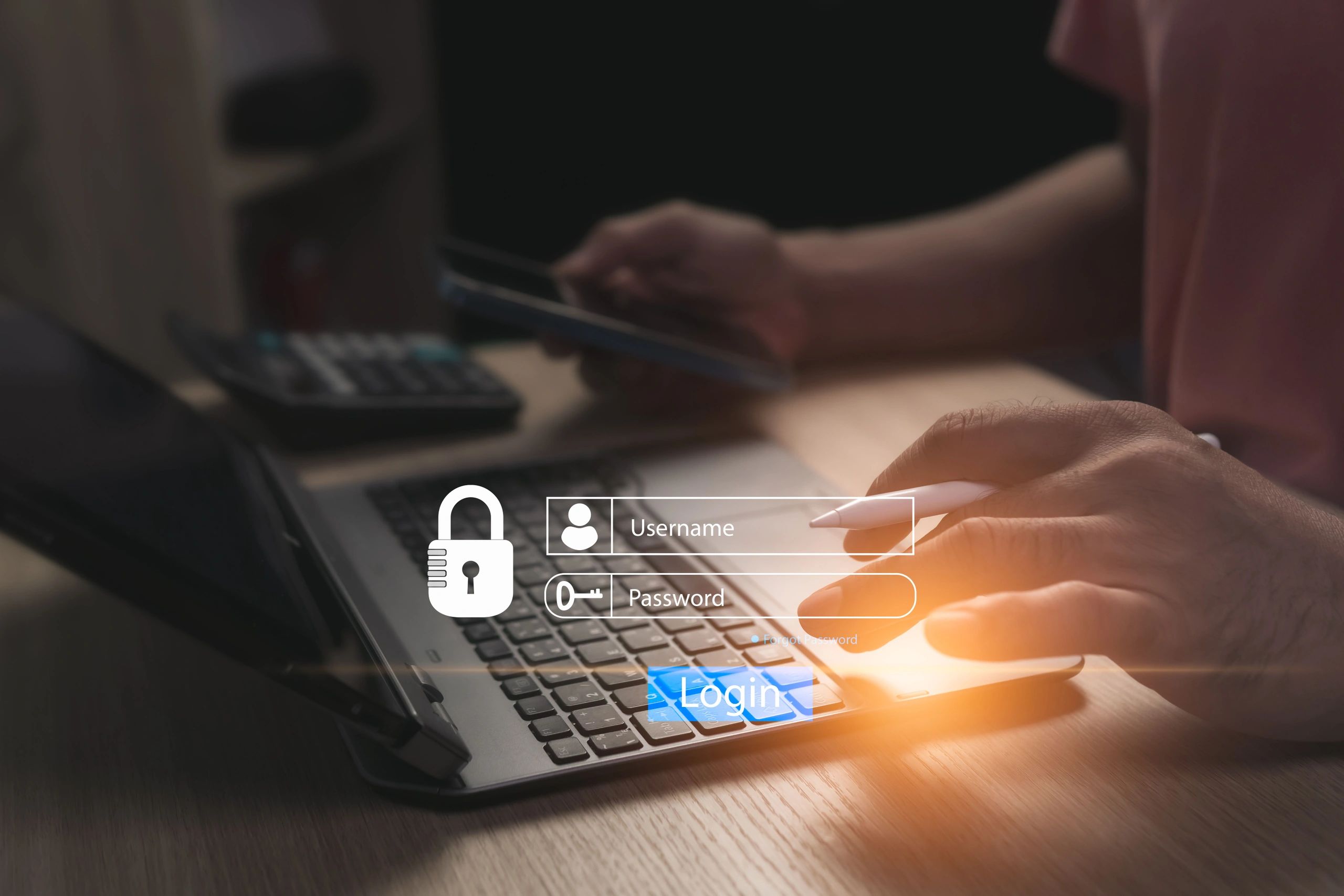 Person reviewing secure account access on a laptop