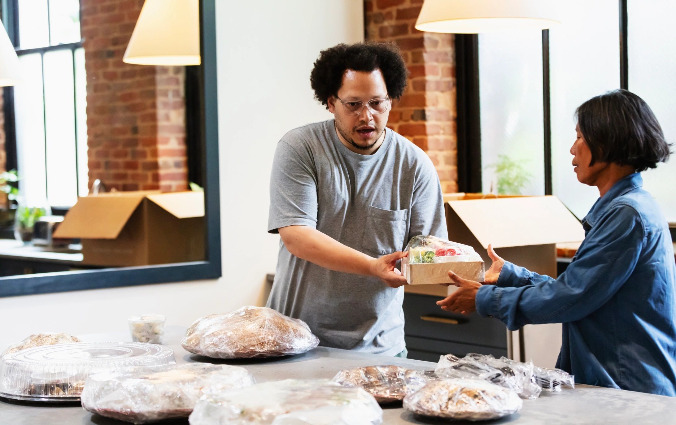 Prepared food being organized for delivery